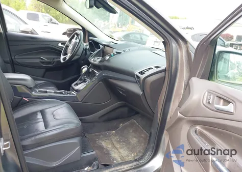 2013 Ford Escape Titanium z USA, uszkodzony, nr VIN 1FMCU9J96DUD74870